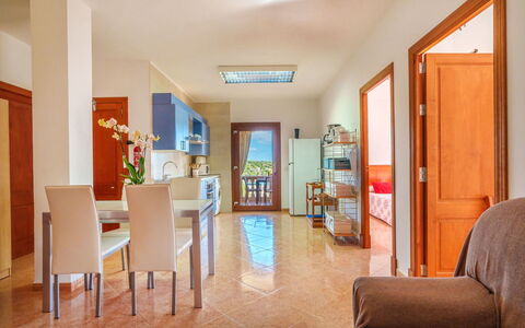 Vista Playa: Mobilia, Televisione, Cornice, Pianta, Costruzione, Pianta Della Casa, Interior Design, Legna, Sedia, Soggiorno