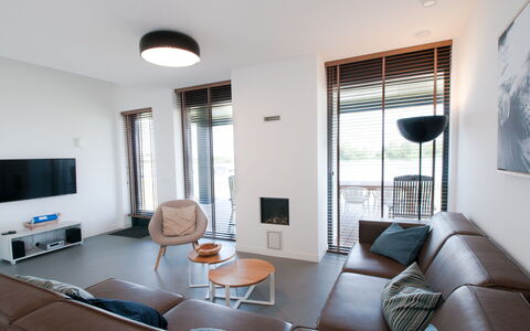 Oesterdam Resort: Divano, Mobilia, Proprietà, Tavolo, Azzurro, Comfort, Finestra, Sedia, Shade, Porta