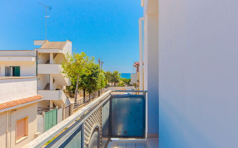 Appartamento Pineta Mare: Cielo, Finestra, Costruzione, Azzurro, Urban Design, Condominio, Facciata, Arecales, Tempo Libero, Appartamento