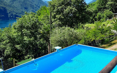 Porlezza 84: Acqua, Cielo, Risorse Idriche, Proprietà, Piscina, Blu, Azzurro, Shade, Paesaggio Naturale, Rettangolo
