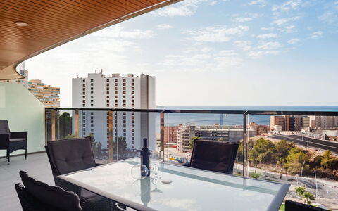 Sunset Waves: Tavolo, Costruzione, Cielo, Mobilia, Nube, Proprietà, Acqua, Sedia, Interior Design, Finestra