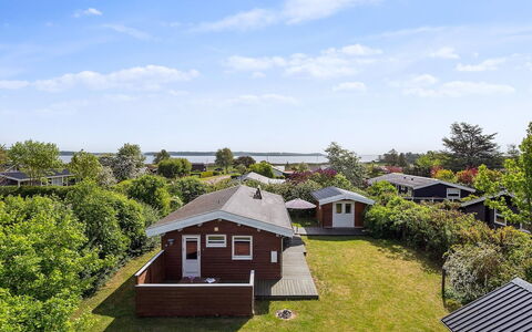 Felicity - 250M from the Sea: Tetto, Casa, Lotto, Casa, Villetta, Estate, Edifici Giardino, Shade, Log Cabin, Landscaping