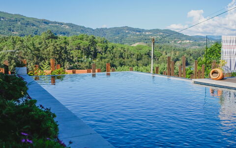 Rio Lima Retreat: Cielo, Acqua, Risorse Idriche, Pianta, Montagna, Nube, Piscina, Azzurro, Vegetazione, Albero