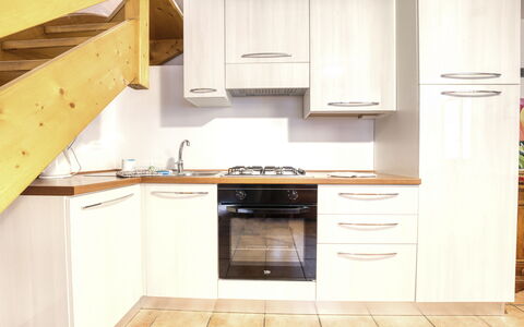 Incanto Walser Apartments Ronco: Cabinetry, Controsoffitto, Mobilia, Cucina, Cucina Stufa, Legna, Cassetto, Costruzione, Interior Design, Pavimentazione