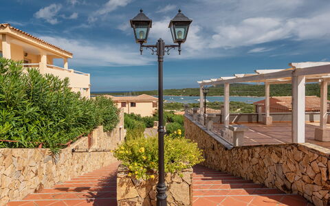 Golfo Aranci Apartments With Ac: Zona Residenziale, Cittadina, Estate, Ricorrere, Balcone, Eco Hotel, Shade, Villa, Hacienda, Landscaping
