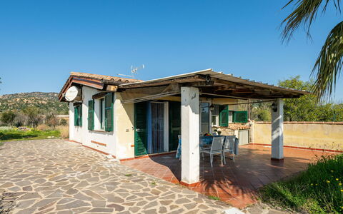 Costa Rei 666: Porta, Villetta, Shade, Estate, Struttura Esterna, Portico, Bicicletta, Villa, Hacienda