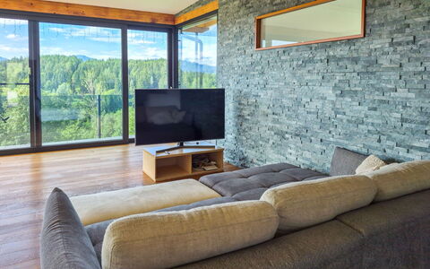 Villa Techelsberg: Pavimentazione, Interior Design, Divano, Soggiorno, Pavimento In Legno, Muro ​​Di Pietra, Latifoglie, Color Legno, Sedia