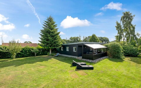 Nicklas - 250M from the Sea: Villetta, Backyard, Cortile, Edifici Giardino, Capannone, Raccordo, Mobili Da Esterno, Log Cabin, Struttura Esterna, Baracca