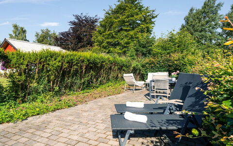 Hjalma - 250M to the Fjord: Verde, Arbusto, Mobili Da Esterno, Giardino, Mobilia, Shade, Groundcover, Sedia, Landscaping, Prato