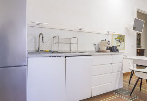 La Casa di Bruno, Terrace, in the Heart of Genova: Elettrodomestico Da Cucina, Cucina, Pavimentazione, Interior Design, Apparecchio Major, Mobilia, Controsoffitto, Legna, Cabinetry, Pavimento