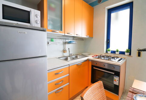 Circe Sea View: Cucina, Elettrodomestico Da Cucina, Apparecchio Major, Controsoffitto, Legna, Lavandino Della Cucina, Cucina Stufa, Cabinetry, Stufa, Interior Design