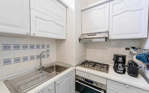 Casa Oscar: Cucina, Elettrodomestico Da Cucina, Apparecchio Major, Controsoffitto, Cucina Stufa, Cabinetry, Pavimentazione, Elettrodomestico, Stufa, Interior Design