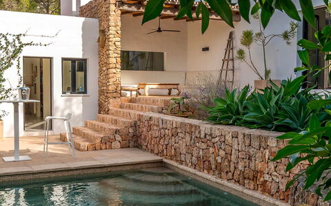 Can Blanca: Parete, Roccia, Muro ​​Di Pietra, Giardino, Flagstone, Shade, Brick, Landscaping, Backyard