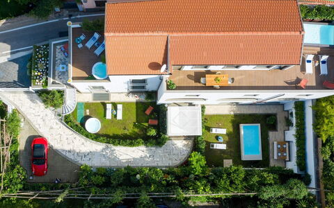 Suite Agave: Zona Residenziale, Casa, Casa, Quartiere, Tetto, Urban Design, Landscaping, Estate, Giardino, Sobborgo