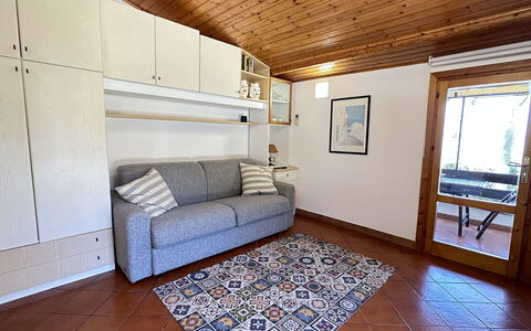 Casa Sally: Mobilia, Interior Design, Pavimentazione, Legna, Pavimento, Camera, Divano, Appartamento, Soffitto, Soggiorno