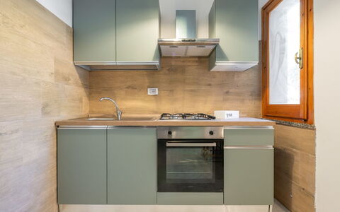 Villa sulla Roccia: Cucina, Elettrodomestico Da Cucina, Apparecchio Major, Controsoffitto, Cabinetry, Pavimentazione, Legna, Interior Design, Elettrodomestico, Cucina Stufa