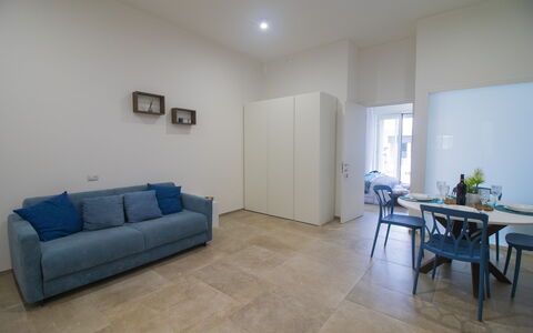 Elementi Luxury Otranto: Pavimentazione, Pavimento, Interior Design, Legna, Mobilia, Soffitto, Camera, Illuminazione, Appartamento, Soggiorno