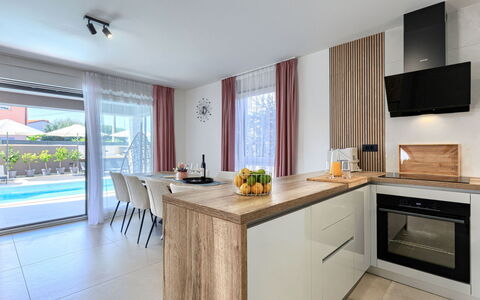 Laluma: Interior Design, Pavimentazione, Controsoffitto, Legna, Mobilia, Pavimento, Cucina, Casa, Cabinetry, Illuminazione