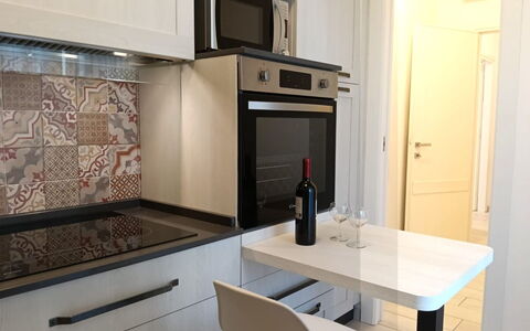 Oasi Blocco a: Pavimentazione, Interior Design, Cucina, Controsoffitto, Pavimento, Elettrodomestico Da Cucina, Mobilia, Apparecchio Major, Cabinetry, Camera